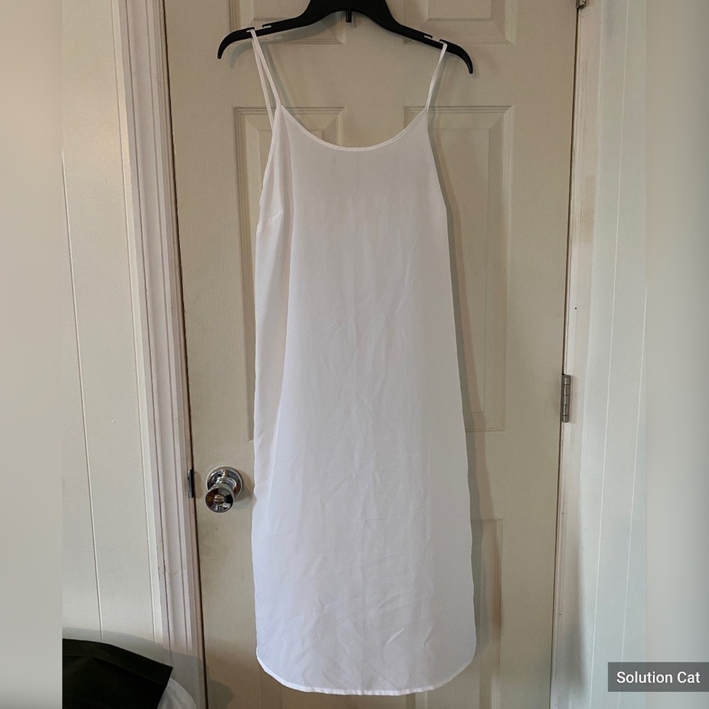 White Michael Kors see-through dress.